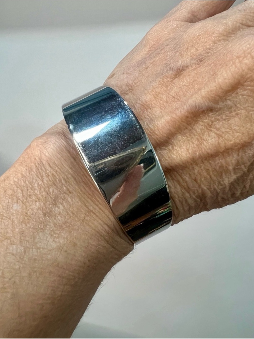 Monet Silver-Tone Wide Cuff Bracelet with Polished Mirror Finish